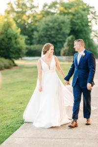 Documentary Atlanta wedding photography capturing newlyweds sharing a quiet walk together after their ceremony