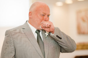 Emotional parent reaction during a wedding first look captured through luxury documentary wedding photography