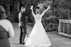 Emotional wedding photo of a groom smiling during an intimate newlywed moment