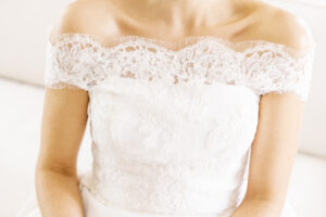 intricate lace detail of bridal gown captured in soft natural light during wedding morning in Atlanta