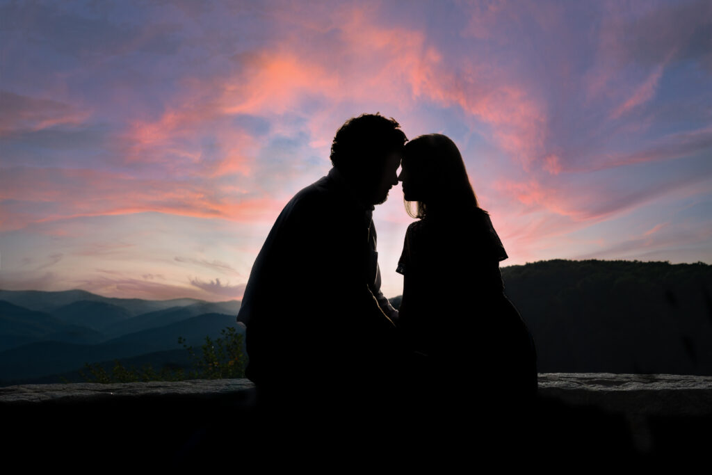 Sunset silhouette during Amicalola Falls engagement photos overlooking the North Georgia mountains