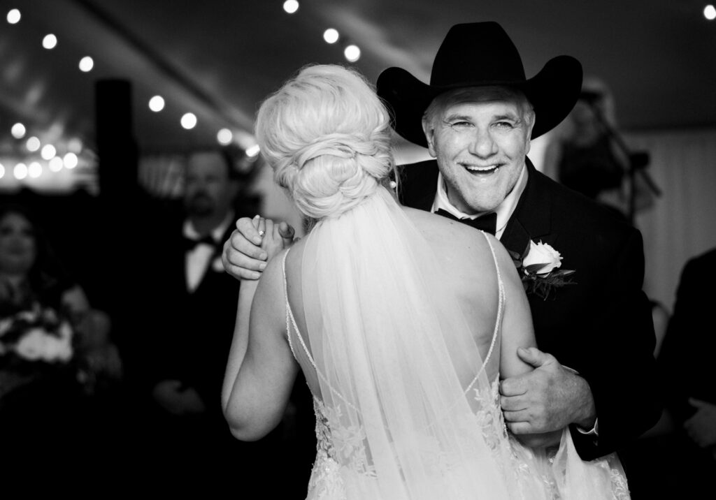 Bride dancing with her father during private estate wedding reception in Lake Mary