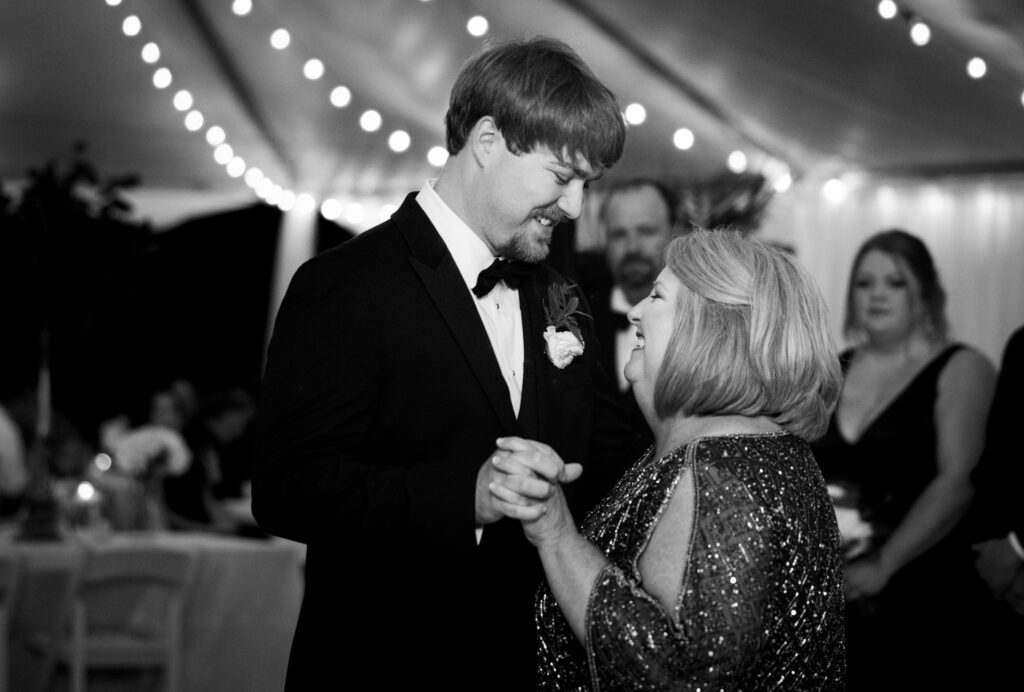 Groom dancing with his mother during reception at a private estate wedding in Lake Mary