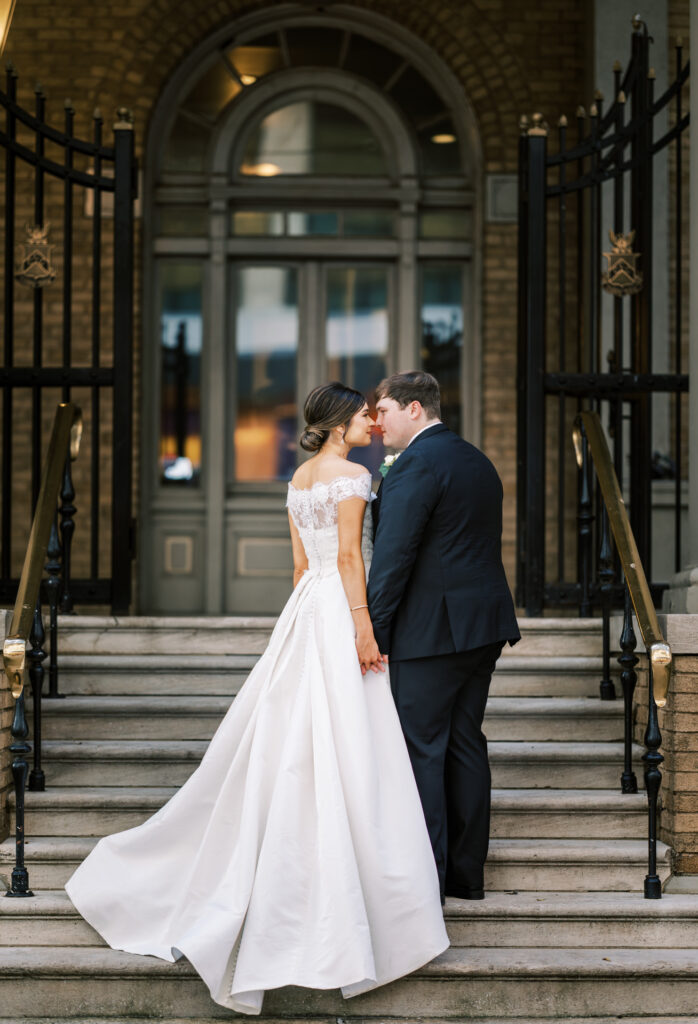 Editorial bride and groom portrait outside Capital City Club Atlanta wedding venue