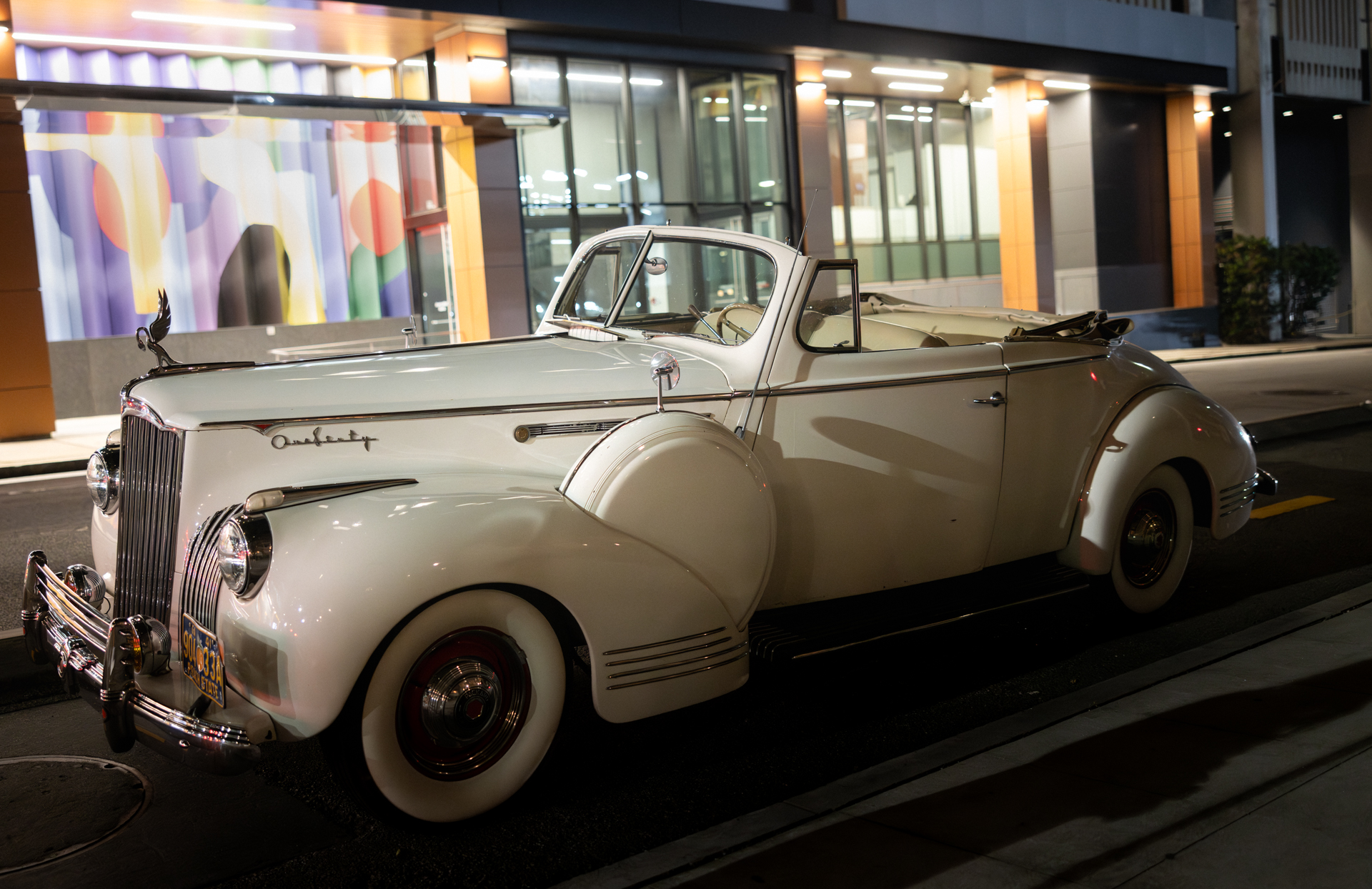 Vintage white getaway car outside Capital City Club wedding reception in downtown Atlanta