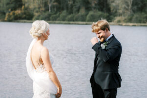 Documentary Atlanta wedding photography capturing a groom wiping tears during an emotional first look