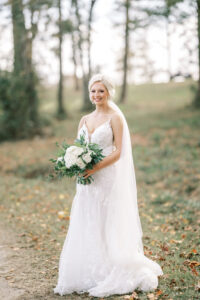 Full length bridal portrait outdoors during a private estate wedding at Lake Mary