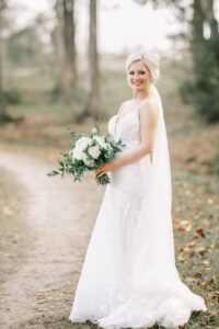 Full length bridal portrait outdoors during a private estate wedding at Lake Mary