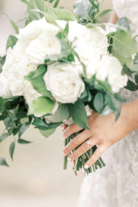 Close-up bridal bouquet portrait with white roses during a private estate wedding at Lake Mary