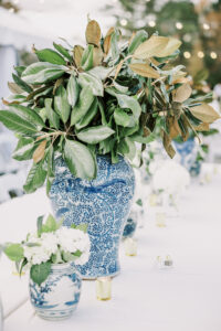Blue and white floral centerpiece styling at a private estate wedding reception in Lake Mary