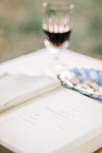 Elegant wine glass detail photographed during a private estate wedding reception at Lake Mary