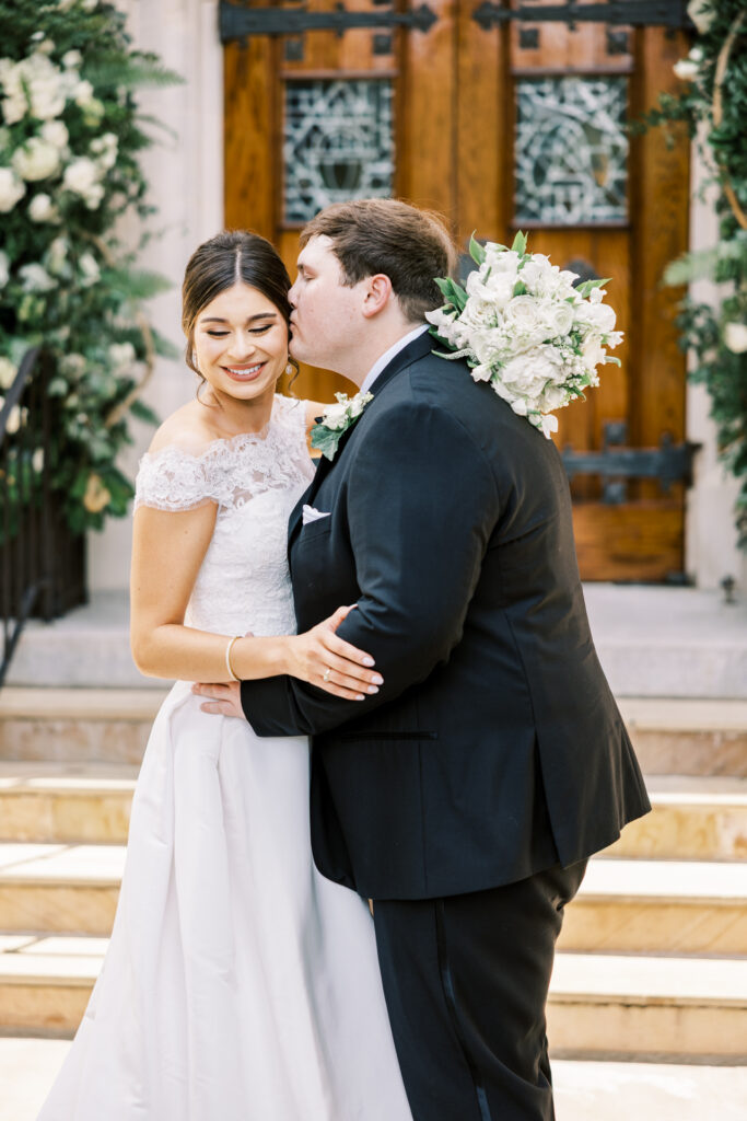 Romantic bride and groom portrait outside Christ the King Cathedral in Atlanta Georgia