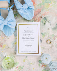Luxury wedding invitation suite with bridal accessories styled for a private estate wedding at Lake Mary