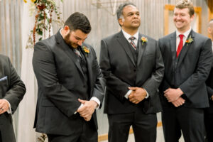 Documentary Atlanta wedding photography capturing a groom becoming emotional before his bride walks down the aisle
