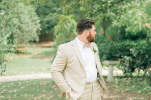 Emotional wedding photo of a groom waiting for his bride before a first look captured through documentary wedding photography