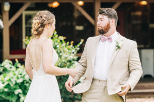 Bride and groom sharing an emotional first look moment captured by a Luxury Atlanta Wedding Photographer